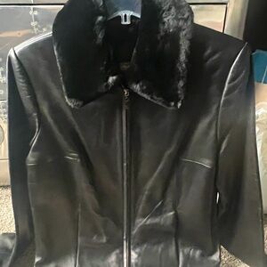 Ladies black leather jacket size M.